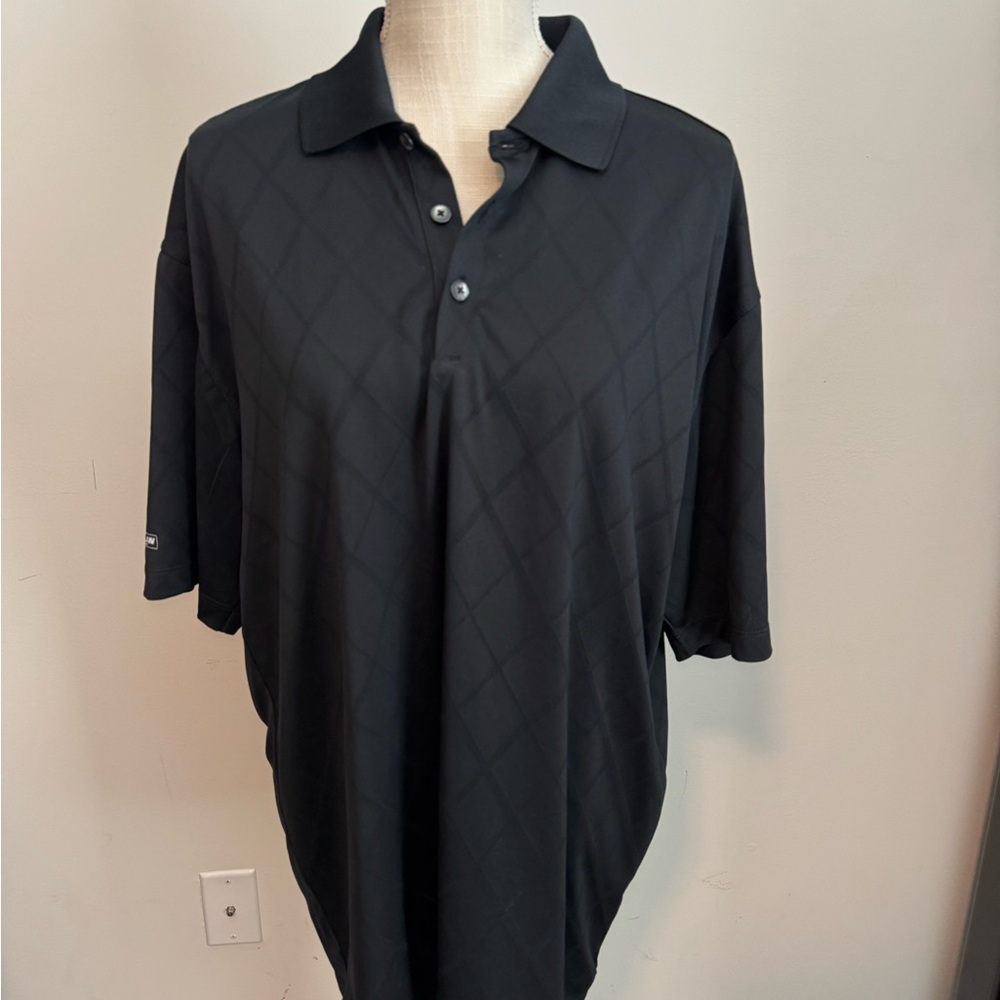 Nike Men’s Black Polo Shirt with Subtle Pattern